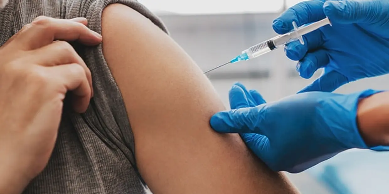 doctor administering a Brixadi injection