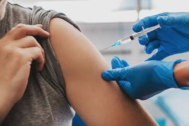 doctor administering a Brixadi injection