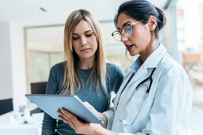 doctor and patient discussing methadone conversion treatment plan